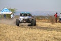 Speeding white Chenowth rally car front view Royalty Free Stock Photo